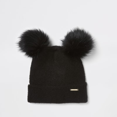 Schwarze Beanie mit Pompon