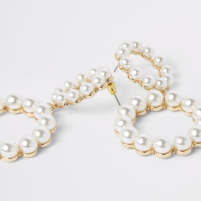 Goudkleurige oorhangers met twee ringen