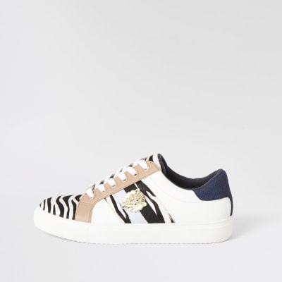 Zwarte sneakers met veters en zebraprint