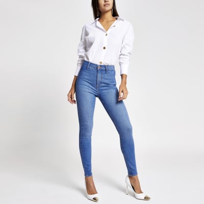 Kaia - Felblauwe discojeans met hoge taille