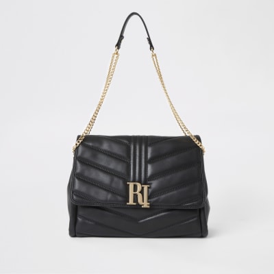 Black RI quilted underarm bag | River Island