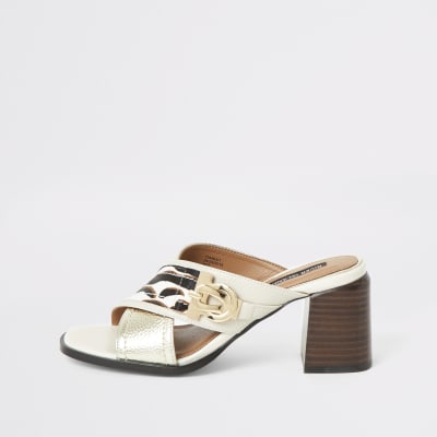 Beige muiltjes met dierenprint en blokhak