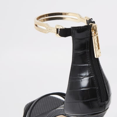 Schwarze Sandalen mit Absatz