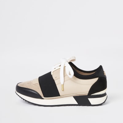 Elastische crème hardloopsneakers met veter
