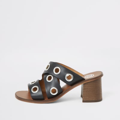 Schwarze Mules aus Leder mit Blockabsatz