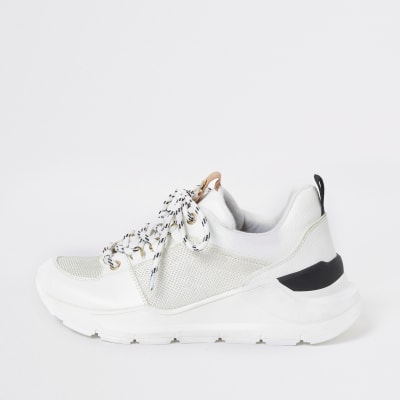 Witte hardloopsneakers met veters