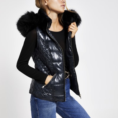 Marineblauwe gewatteerde bodywarmer met imitatiebont capuchon