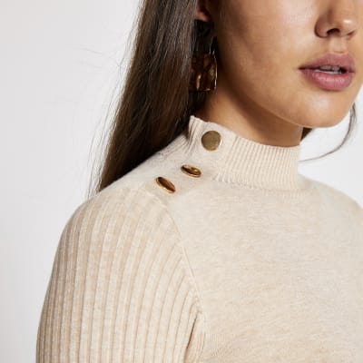 Langärmeliges Rippstrickoberteil in Beige mit hohem Kragen