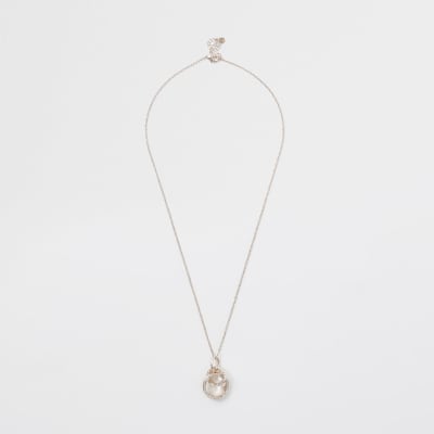 Roségoudkleurige ketting met onderling verbonden hangertjes