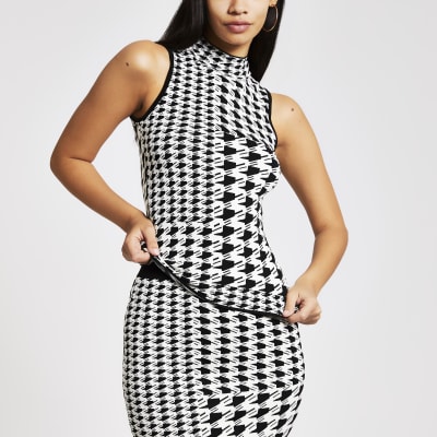 Witte tanktop met pied-de-poule-motief en col