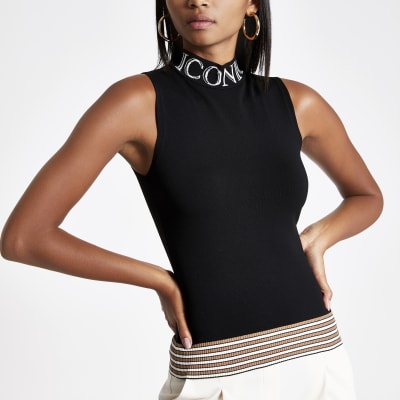 Zwarte gebreide top met col en 'Iconic'-print