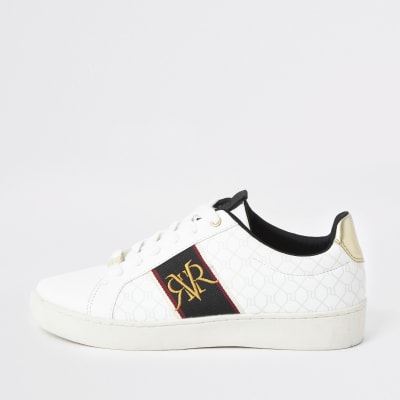 Witte sneaker met streep en monogram