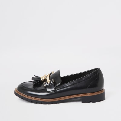 Platte wijde zwarte loafer met kwastje