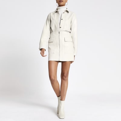 Beige bikerrok van imitatieleer