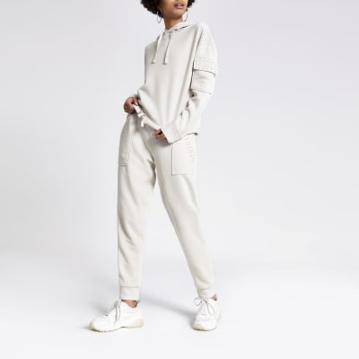 Crème joggingbroek met diamantjes