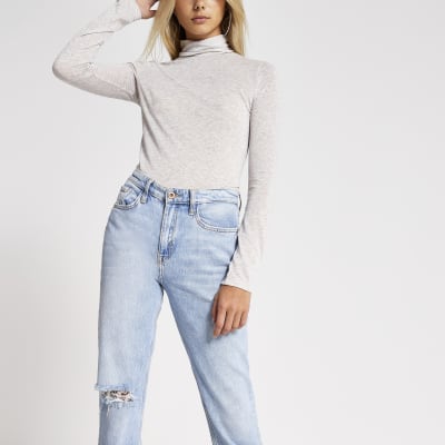 Beige aansluitende top met col en lange mouwen