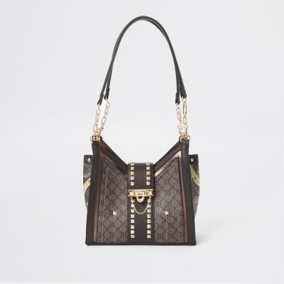 Dunkelbraune Tasche mit RI-Monogramm und Nieten