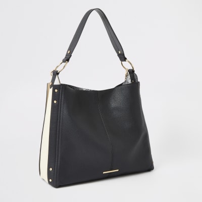 Black oversized ring front slouch bag