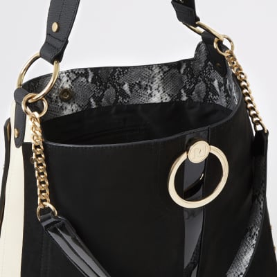 Black oversized ring front slouch bag