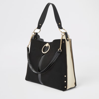 Black oversized ring front slouch bag