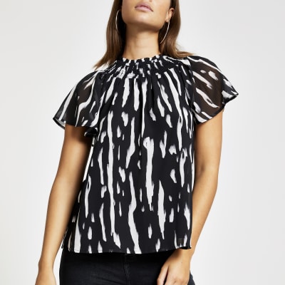 Zwarte gesmokte top met print