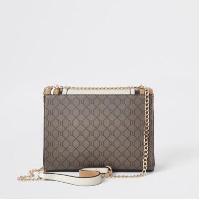 Dark beige RI monogram quilted cross body bag