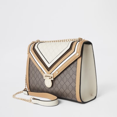 Dark beige RI monogram quilted cross body bag