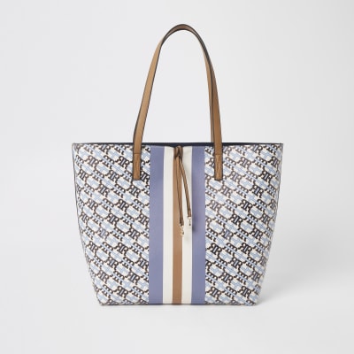 Blauwe shopper met RI-monogram