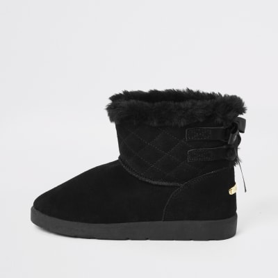 Black suede quilted faux fur lined boots