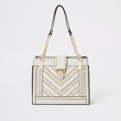 Cremefarbene Tote Bag mit Nieten