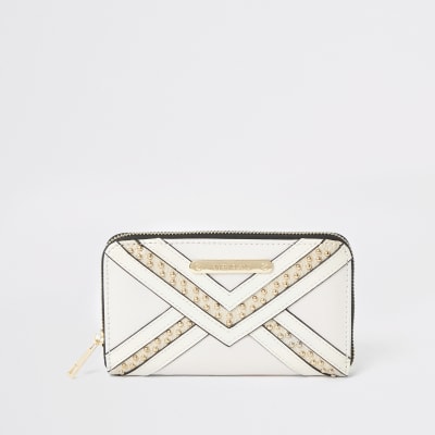 Crème portemonnee met rits rondom en studs