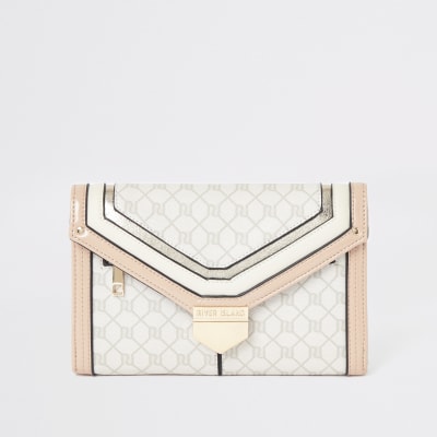 Lichtroze reisportemonnee met RI-monogram