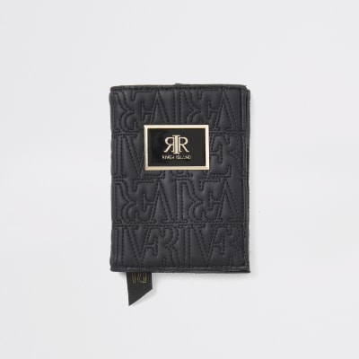 Zwarte paspoorthouder met RI-reliëf