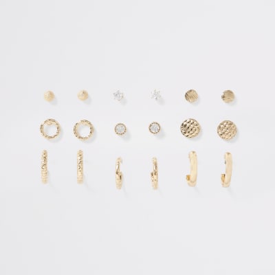 Goldene Ohrstecker und Creolen, Set