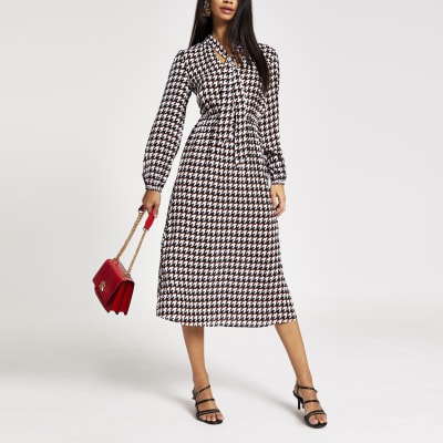 Schwarze Minikleid in Hahnentritt-Muster mit Bindeband