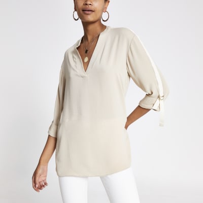 Crèmekleurig oversized overhemd met omgeslagen mouwen