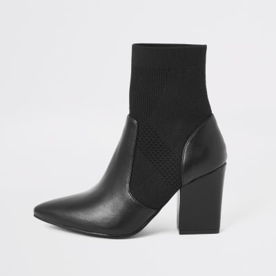 Schwarze Strickstiefel