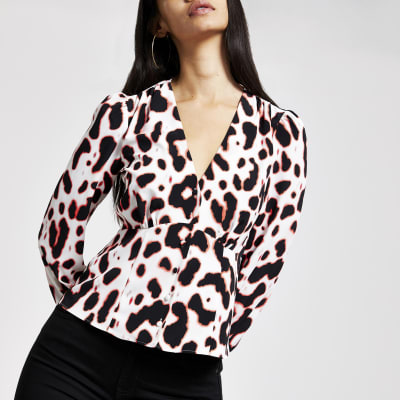 Crème top met luipaardprint