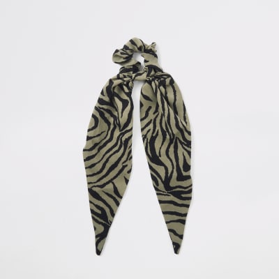 Groen sjaalhaarbandje met zebraprint