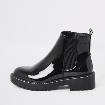 Bottes noires vernies avec semelle épaisse, coupe large