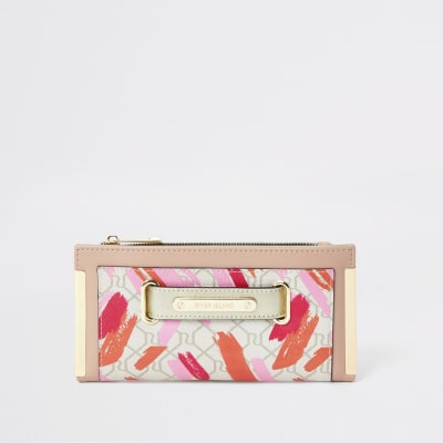 Beige portemonnee met RI-monogram en lipstickvlekken