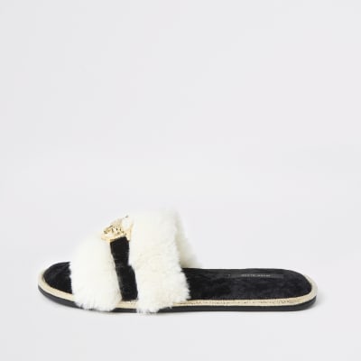 Crèmekleurige pantoffelmuiltjes van imitatiebont