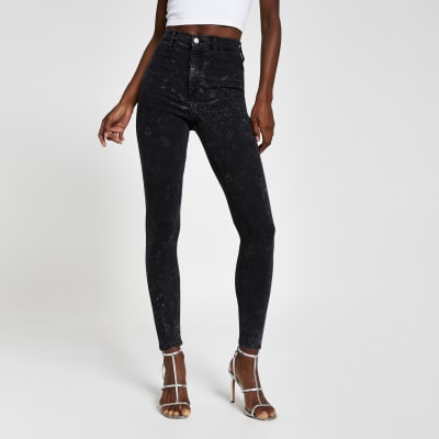 Kaia - Zwarte acid discojeans met hoge taille