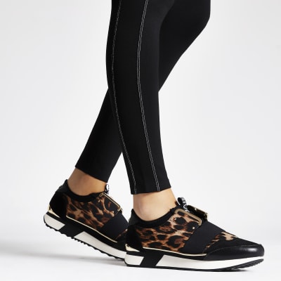 Elastische schwarze Sneaker mit Leoprint