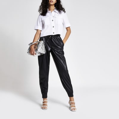 Zwarte ruimvallende joggingbroek van PU