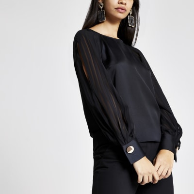 Langärmeliges Plisee-Oberteil in Schwarz mit Schlitz