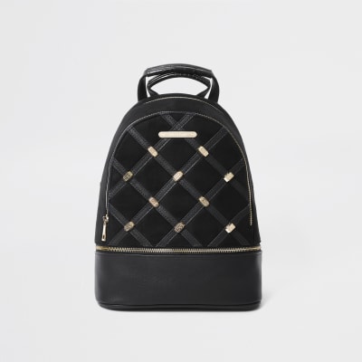 Black quilted and stud backpack