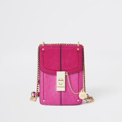 Pink RI monogram lock front cross body bag