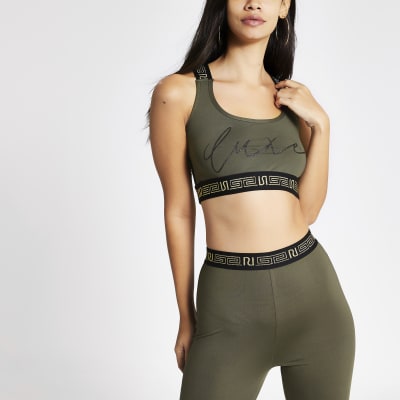 Kaki crop top met 'Luxe' print
