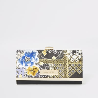 Zwarte cliptop beurs met bloemenprint